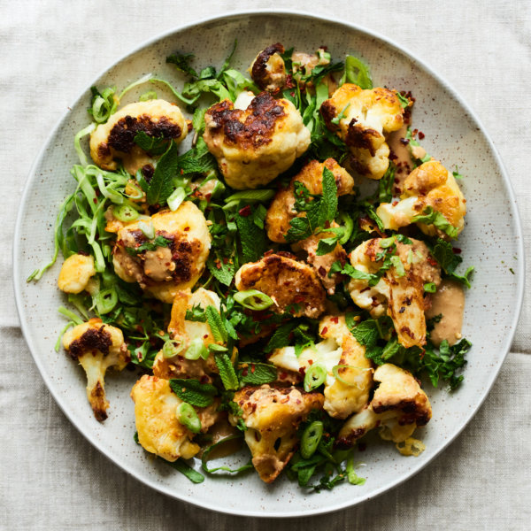 Cauliflower fritters with almond and chilli dressing